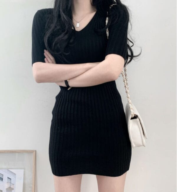 Ladies' high-end black V-neck short sleeved skirt with hip wrap