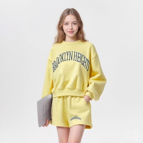 a woman in yellow set Factory-customized fashionable women's sporty style heavyweight pure cotton daily casual set
